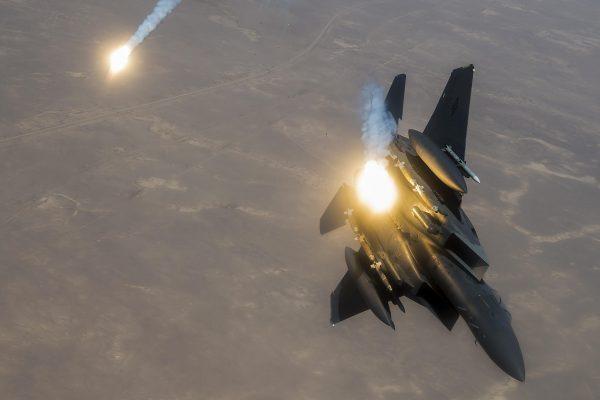 An Air Force F-15E Strike Eagle fires flares during a flight supporting Operation Inherent Resolve on June 21, 2017. (Air Force photo by Staff Sgt. Trevor T. McBride)