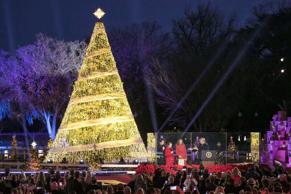 First Lady Melania Trump switches on the Christmas tree lights at the 95th annual National Christmas Tree Lighting at the White House Ellipse in Washington on Nov. 30, 2017. (Samira Bouaou/The Epoch Times)