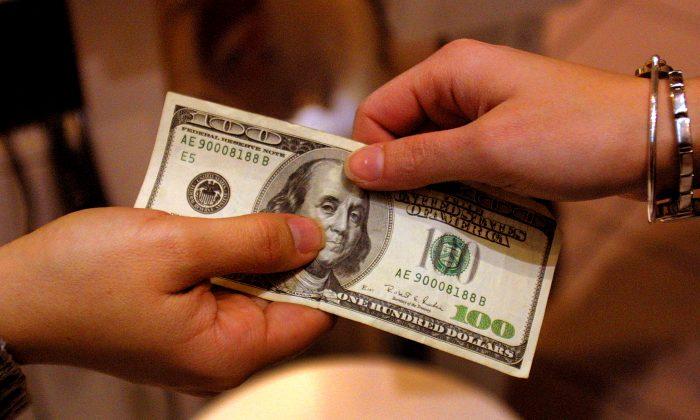Police Warn of Fake Dollar Bills With Chinese Writing