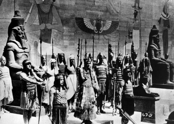 1923: A scene from silent version of the epic film 'The Ten Commandments', also directed by Cecil B. DeMille. The Egyptian pharaoh is surrounded by his guards as he prepares to lead his army. (Topical Press Agency/Getty Images)
