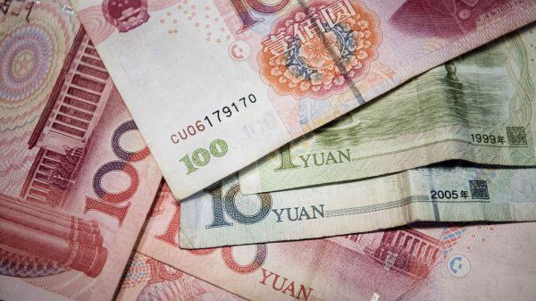 Chinese 100 yuan, 10 yuan and one yuan notes, a photo illustration taken in Beijing. (Fred Dufour/AFP/Getty Images)