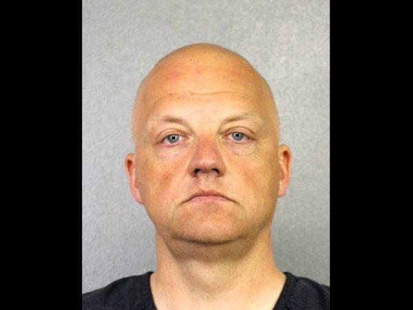 FILE PHOTO - Volkswagen executive Oliver Schmidt, charged with conspiracy to defraud the United States over the company's diesel emissions scandal is shown in this booking photo in Fort Lauderdale, Florida, U.S. provided on January 9, 2017. (Courtesy of Broward County Sheriff's Office/Handout via Reuters)
