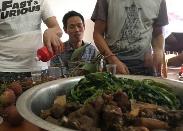 Dog meat is served at a restaurant in Yulin, in China's southern Guangxi region on June 21, 2017.<br/>China's most notorious dog meat festival opened in Yulin on June 21, 2017, with butchers hacking slabs of canines and cooks frying the flesh following rumours that authorities would impose a ban this year. (Becky Davis/AFP/Getty Images)