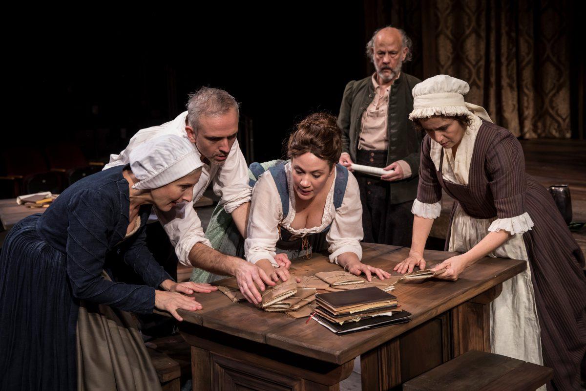 (L–R) The King’s Men Henry Condell (Gregory Linington) and John Heminges (Jim Ortlieb), as well as Alice Heminges (Dana Black), in the alehouse. (Northlight Theatre)