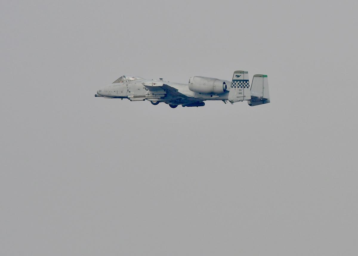A U.S. Air Force A-10 Thunderbolt II fighter aircraft, assigned to the 25th Fighter Squadron, flies over Osan Air Base during Exercise VIGILANT ACE 18 on Dec. 3. The twin turbofan plane is heavily armored and nicknamed the "Warthog." (U.S. Air Force photo by Staff Sgt. Franklin R. Ramos)