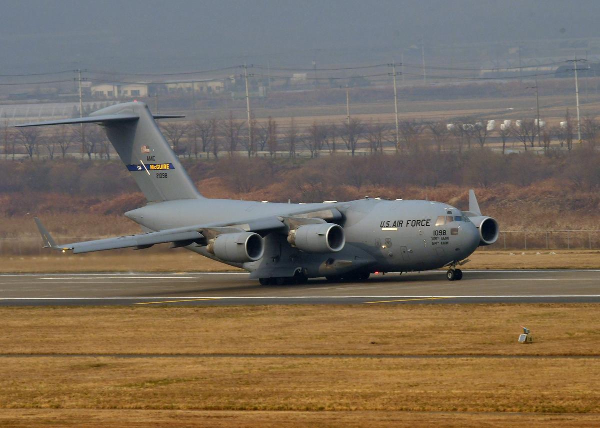 A U.S. Air Force C-17 Globemaster III cargo aircraft, assigned to Joint Base McGuire-Dix-Lakehurst, N.J., begins take-off during Exercise VIGILANT ACE 18 at Osan Air Base, Republic of Korea, Dec. 3, 2017. (U.S. Air Force photo by Staff Sgt. Franklin R. Ramos/Released)