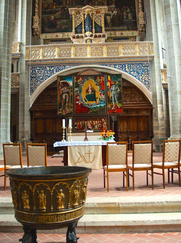 The interior of Market Church in Halle, with Handel's baptismal font in the foreground and the famous Reichel organ behind the altar. (Carole Jobin)