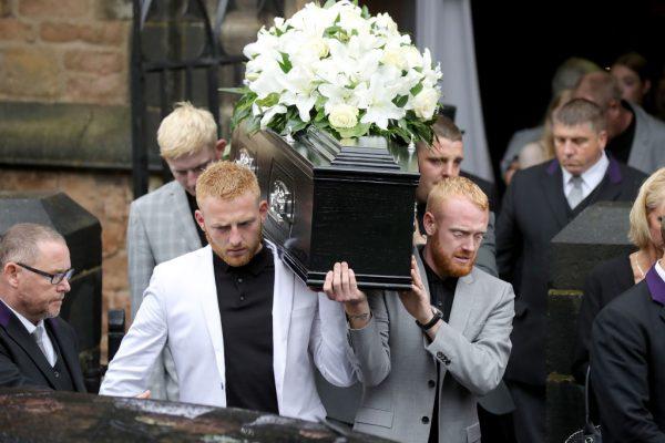 The funeral cortege of Manchester attack victim Alison Howe leaves St. Anne's Church on June 23, 2017, in Oldham, England. (Christopher Furlong/Getty Images)