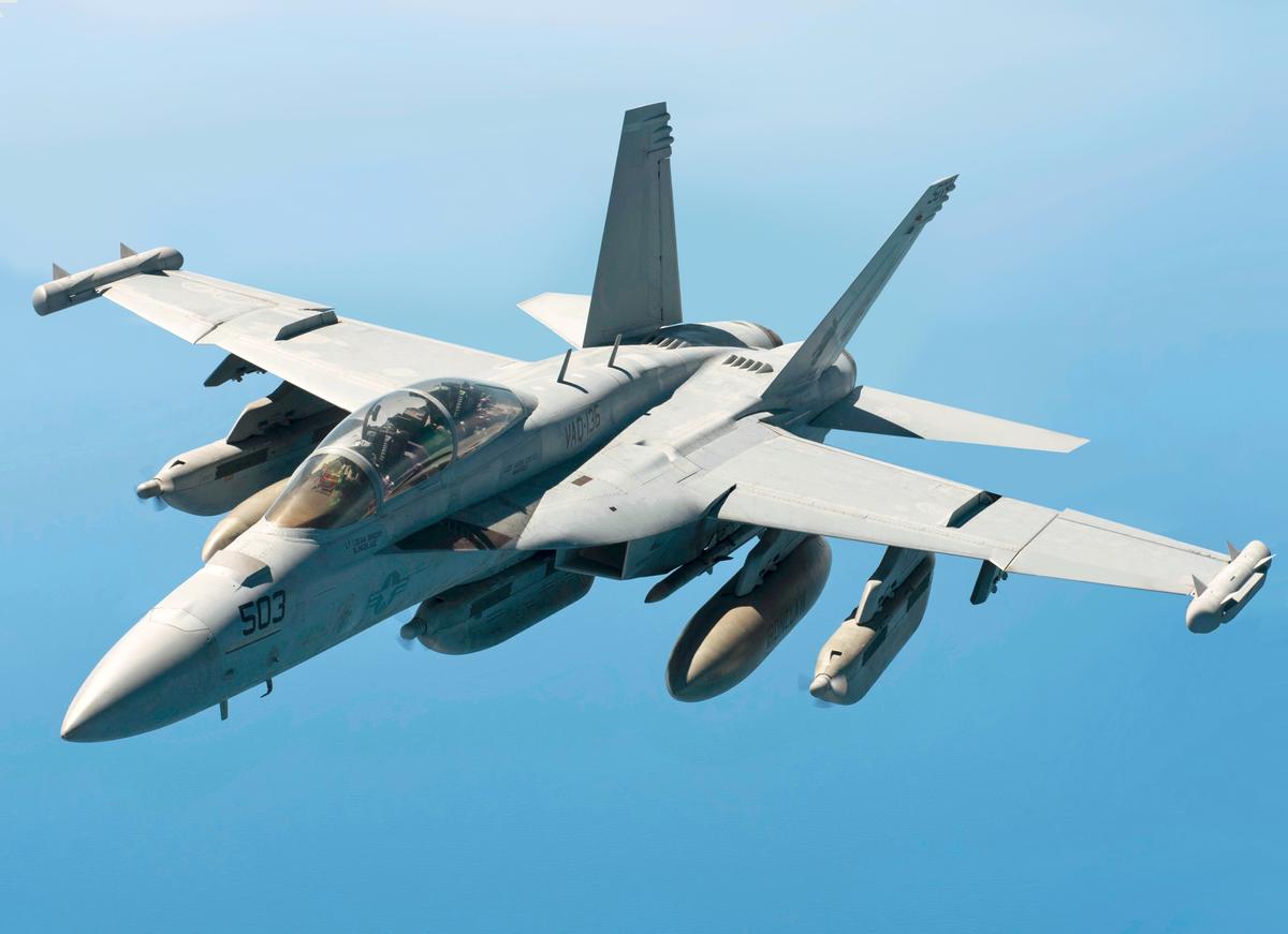 A U.S. Navy EA-18G Growler seen after conducting in-air refueling May 3, 2017, over the Western Pacific Ocean. The jet is an electronic warfare aircraft used to jam enemy radar and otherwise degrade or deceive enemy efforts to sense U.S. aircraft. (U.S. Air Force photo by Senior Airman John Linzmeier)