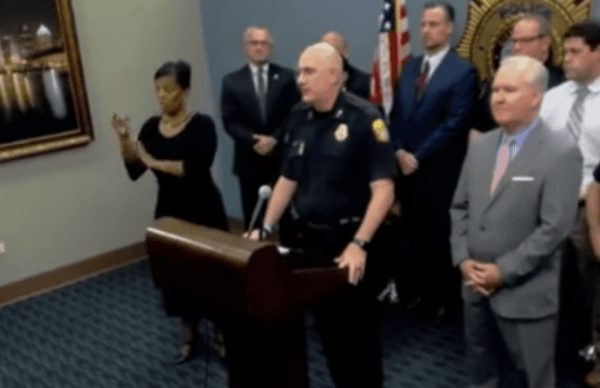 A woman accused of signing incomprehensibly tries to interpret a press conference of the Tampa Police Department on Nov. 28. (Screenshot/Tampa Police Dept/Youtube)