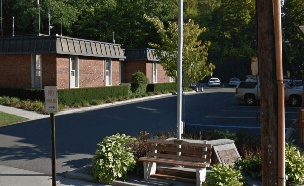 The parking lot by the Village Hall building which houses the Village Justice Court and the Northport Police Department in Northport, New York. (Screenshot via Google Street View)