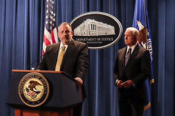 Acting DEA Administrator Robert Patterson (L) and Attorney General Jeff Sessions announce new initiatives to help combat the opioid epidemic, at the Justice Department in Washington on Nov. 29, 2017. (Charlotte Cuthbertson/The Epoch Times)