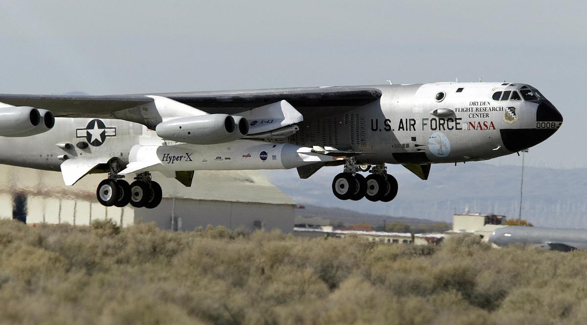 A B-52B launch aircraft lifts off with NASA's X-43A hypersonic research aircraft attached under its right wing on Nov. 16, 2004, at NASA Dryden Flight Research Center at Edwards Air Force Base, California.  The X-43A was one of the early hypersonic jets. (ROBYN BECK/AFP/Getty Images)