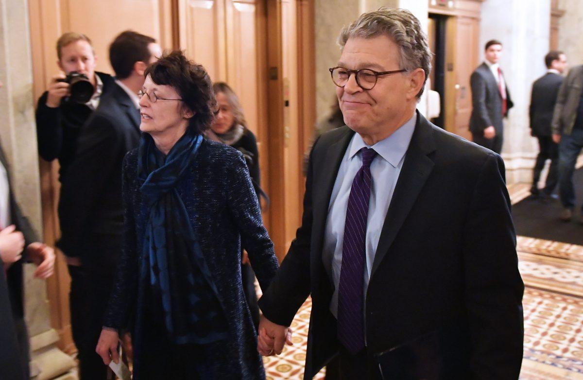 Sen. Al Franken (D-Minn) (R) and his wife Franni Bryson arrive at the U.S. Capitol in Washington on Dec. 7, 2017. (Mandel Ngan/AFP/Getty Images)