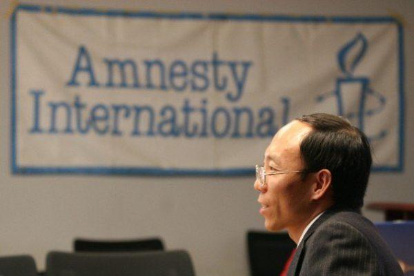 He Lizhi, a former Amnesty International prisoner of conscience, speaks of his experience being imprisoned and tortured in China, in this file photo. (Faluninfo.net)