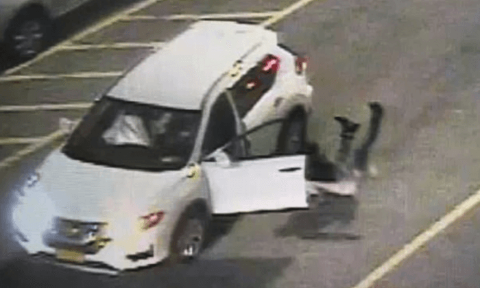 Getaway Van Drags Security Guard Through Mall Parking Lot, Video Shows