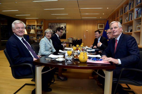 (L to R) Britain's Secretary of State for Exiting the European Union David Davis, Britain's Prime Minister Theresa May, European Commission President Jean-Claude Juncker, and European Union's chief Brexit negotiator Michel Barnier meet at the European Commission in Brussels, Belgium, December 8, 2017. (Reuters/Eric Vidal)