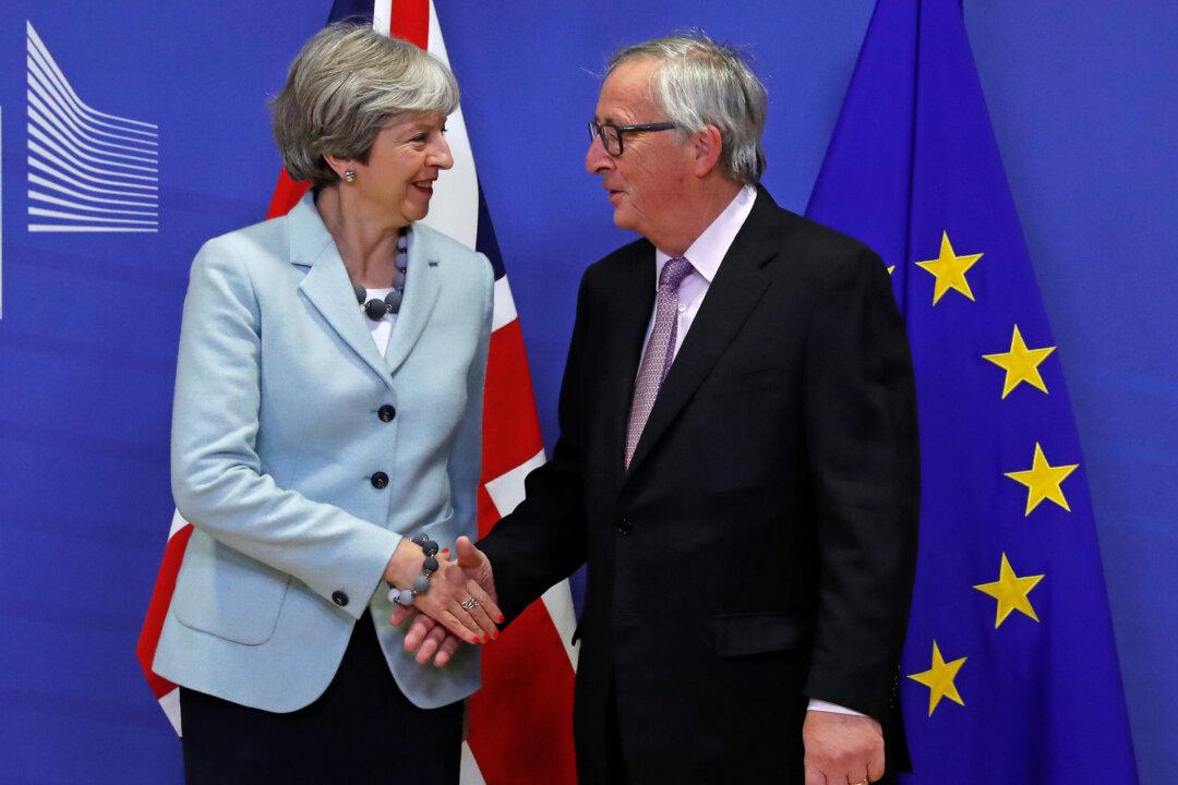 Britain and EU Clinch Divorce Deal to Move Brexit Talks Onto Trade