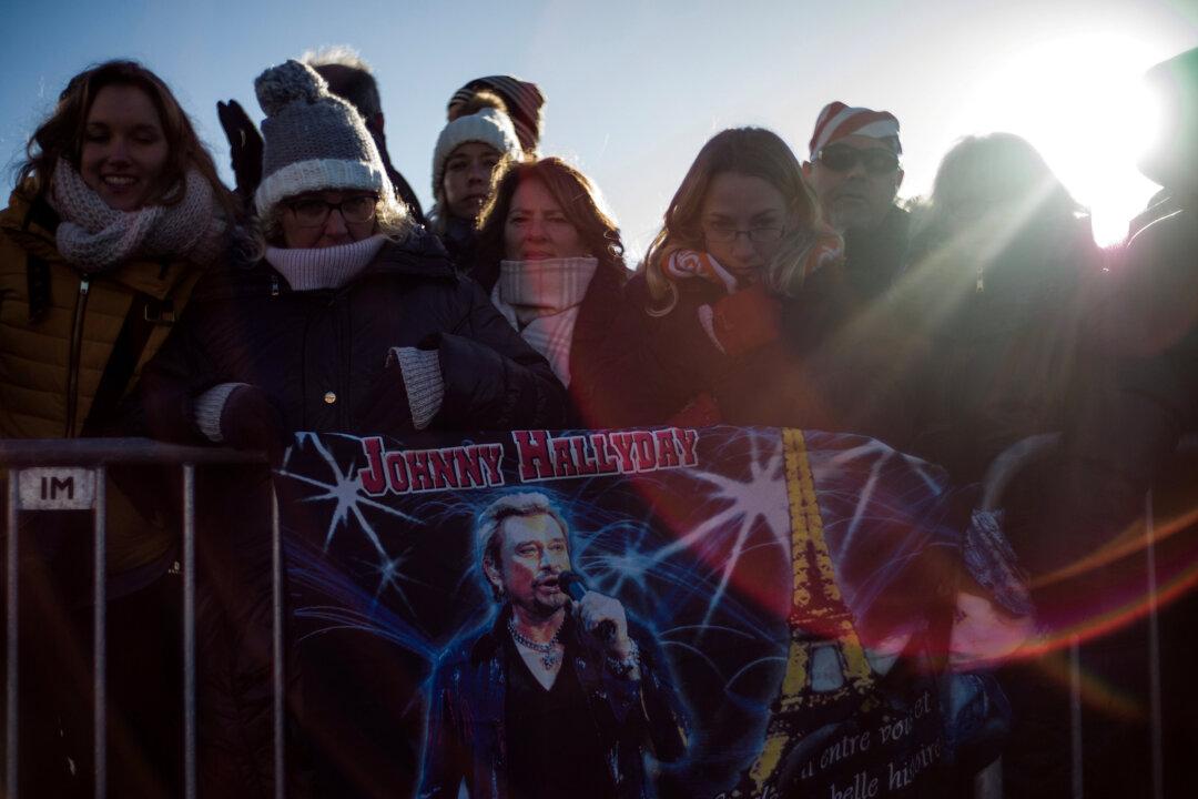 Thousands Mourn Rock Idol Hallyday at Paris Memorial