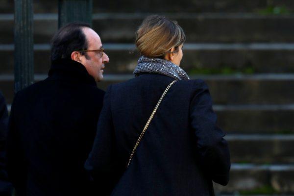 Former French President Francois Hollande and Julie Gayet arrive at the Madeleine Church to attend a ceremony during a 'popular tribute' to late French singer and actor Johnny Hallyday in Paris, France, December 9, 2017. (Reuters/Charles Platiau)