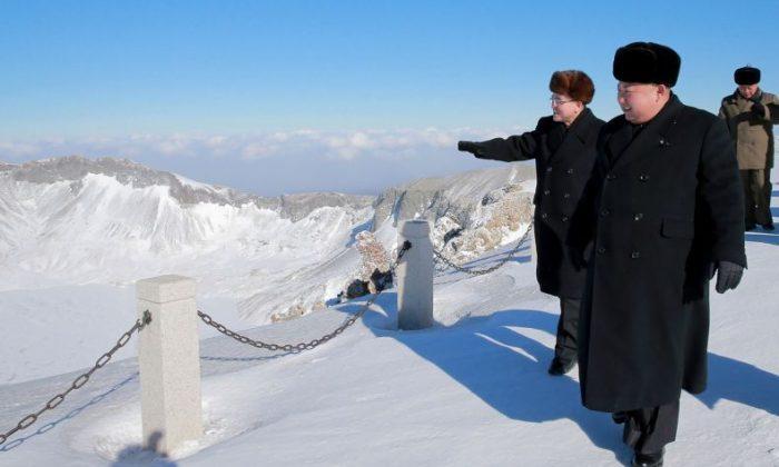 Kim Jong Un Releases Bizarre Propaganda Photo of Him Climbing ‘Sacred Mountain’