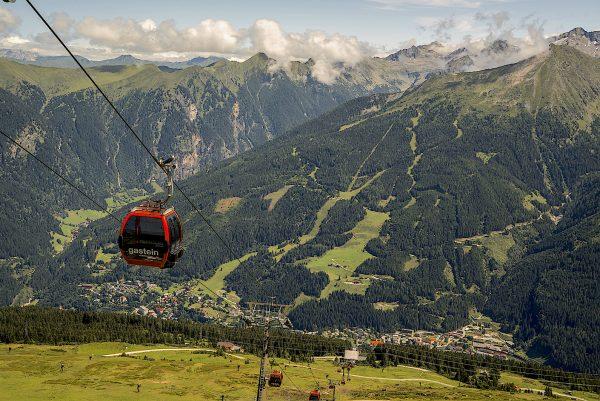 A cable car soars over Bad Gastein and the Graukogel pine forest. (Mohammad Reza Amirinia)