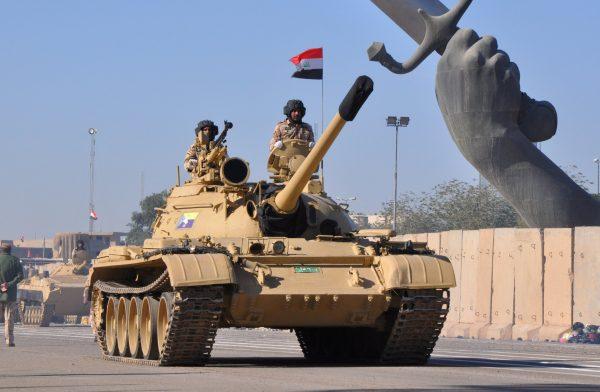 Tanks of Iraqi army are seen during an Iraqi military parade in Baghdad's fortified Green Zone, Iraq Dec. 10, 2017. (Reuters/Stringer)