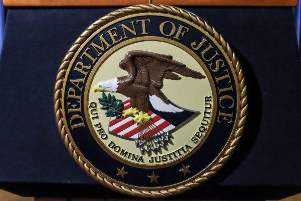 The Justice Department seal. (Charlotte Cuthbertson/The Epoch Times)