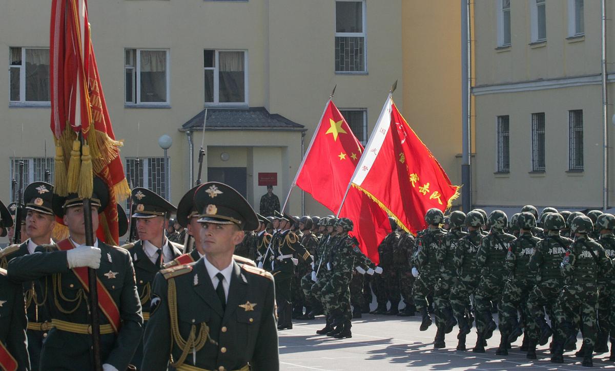 Russian and Chinese soldiers march during the opening ceremony of the Russian-Chinese joint counterterrorism exercise, called "Friendship 2007," in Balashikha outside Moscow, on Sept. 04, 2007. (MAXIM MARMUR/AFP/Getty Images)