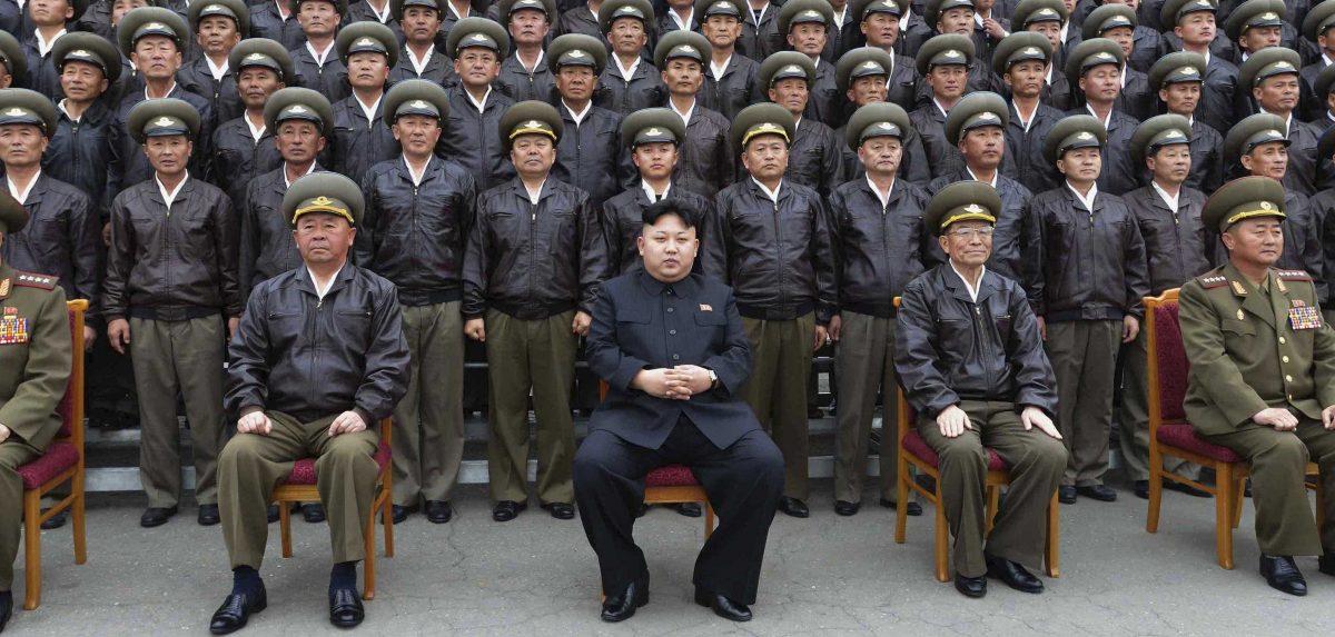 North Korean dictator Kim Jong Un and troops in this undated file photo released by North Korean state media.