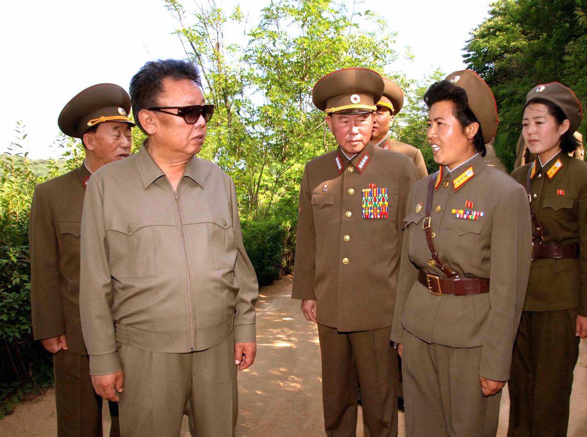 This undated picture, released from Korean Central News Agency on June 11, 2008, shows North Korean leader Kim Jong Il (L) chatting with female soldiers as he inspects Korean People's Army unit 958 at undisclosed place AFP PHOTO / KCNA via KNS (Photo credit should read STR/AFP/Getty Images)