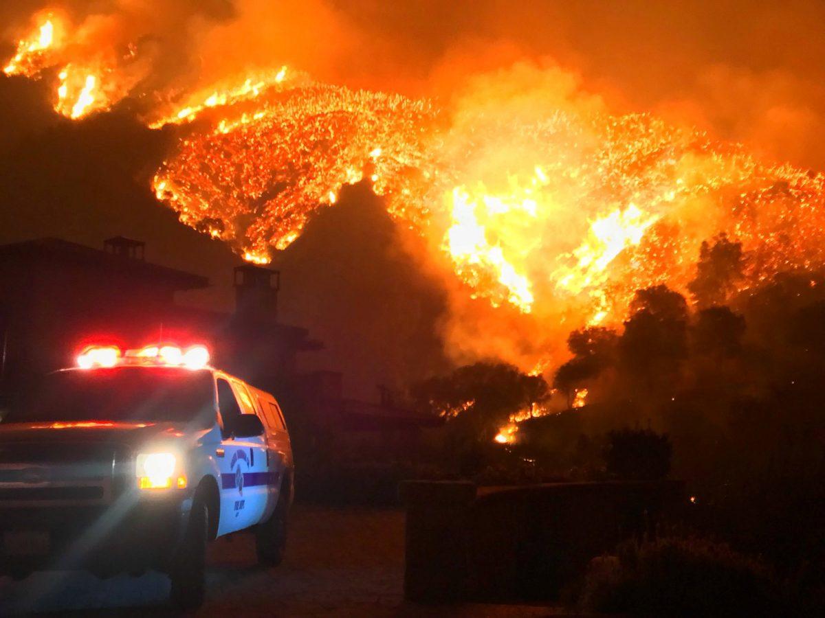 Thomas wildfire burns above Bella Vista Drive near Romero Canyon in this social media photo by Santa Barbara County Fire Department in Montecito, California, U.S. Dec. 12, 2017. (Mike Eliason/Santa Barbara County Fire Department/Handout via Reuters)