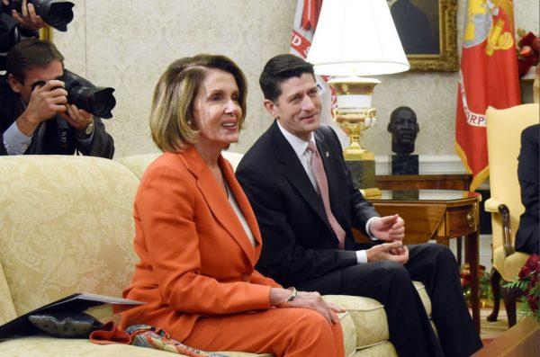 House Minority Leader Rep. Nancy Pelosi (D-CA) and House Speaker Paul Ryan (R-WI) attend a meeting with U.S. President Donald Trump and other congressional leadership in the Oval Office of the White House in Washington, DC. on Dec. 7, 2017 (Olivier Douliery - Pool/Getty Images)
