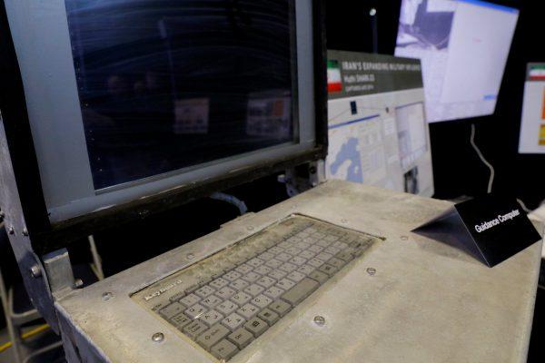 A computer guidance system with Farsi keyboard that the U.S. Department of Defense says was built in Iran and that the Pentagon says is designed to guide bomb laden attack boats to their targets is seen on display at a military base in Washington, U.S., December 13, 2017. (Reuters/Jim Bourg)