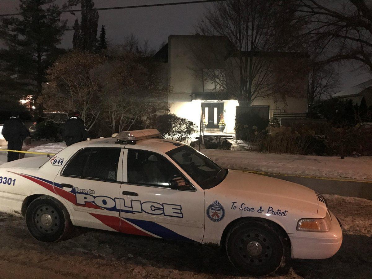 Police outside of the home of billionaire founder of Canadian pharmaceutical firm Apotex Inc., Barry Sherman, and his wife Honey, who were found dead in their home under circumstances that police described as "suspicious" in Toronto, Canada, Dec. 15, 2017. (Reuters/Chris Helgren)