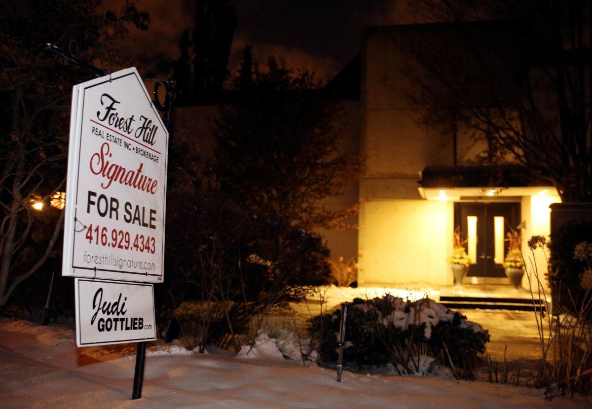 A For Sale sign stands outside the home of billionaire founder of Canadian pharmaceutical firm Apotex Inc., Barry Sherman and his wife Honey, who were found dead under circumstances that police described as "suspicious" in Toronto, Ontario, Canada on Dec. 15, 2017. (Reuters/Chris Helgren