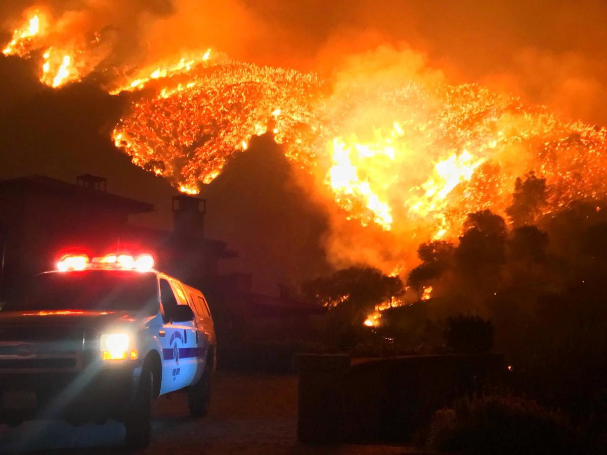 Thomas wildfire burns above Bella Vista Drive near Romero Canyon in this social media photo by Santa Barbara County Fire Department in Montecito, California on Dec. 12, 2017. (Mike Eliason/Santa Barbara County Fire Department/Handout via Reuters)