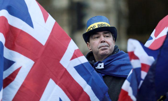 An anti-Brexit protester demonstrates outside the Houses of Parliament in London, Britain, Dec. 13, 2017. (Reuters/Simon Dawson)