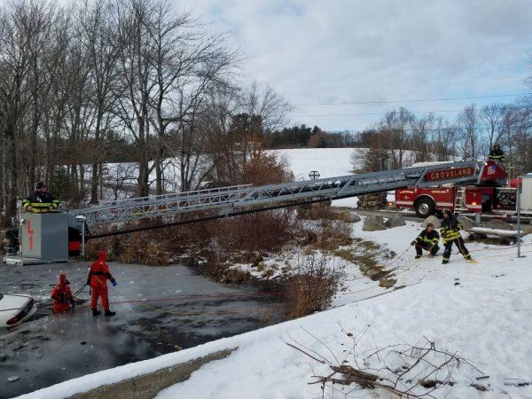 Emergency responders remove a car from Johnsons Pond, Groveland, Mass. on Dec 16. (Groveland Police and Fire Departments)