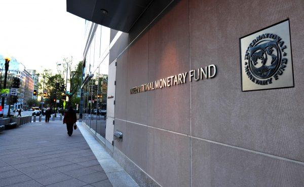 The International Monetary Fund (IMF) building sign, in Washington, DC. on April 5, 2016. (Karen Bleier/AFP/Getty Images)