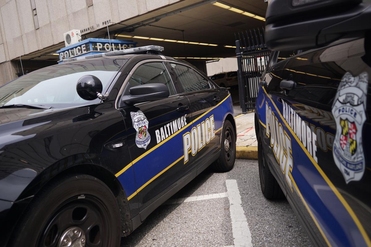 Police cars in Baltimore on Aug. 8, 2017. In 2016 violent crime in Baltimore was up 22 percent and murders up 78 percent, according to Attorney General Jeff Sessions. (MANDEL NGAN/AFP/Getty Images)