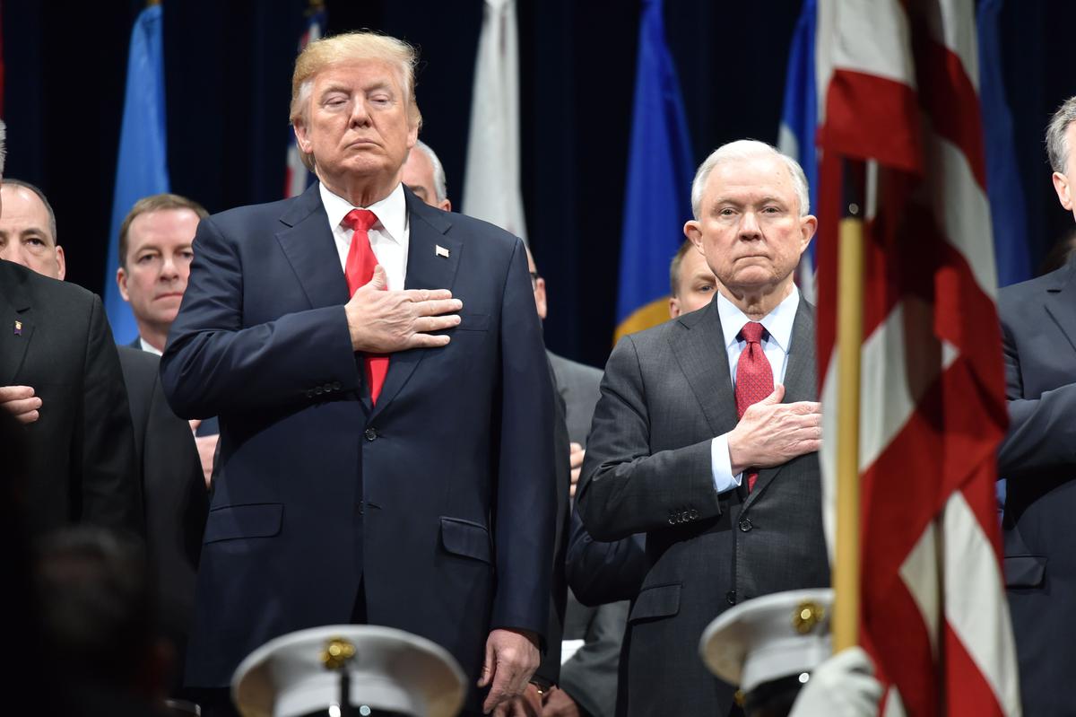 President Donald Trump and Attorney General Jeff Sessions at the FBI National Academy graduation ceremony on Dec. 15, 2017, in Quantico, Virginia. (NICHOLAS KAMM/AFP/Getty Images)