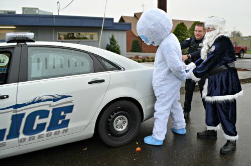 Santa ‘Arrests’ Abominable Snowman for Drunk Driving in Police Campaign