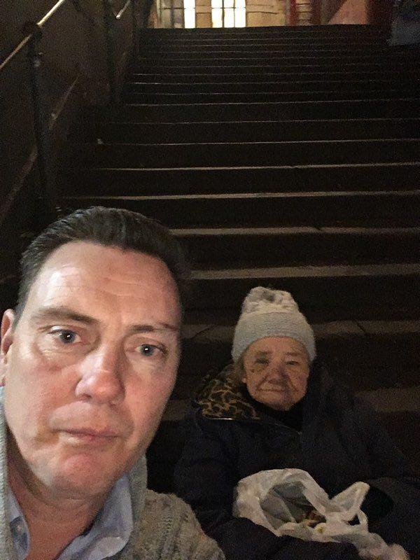 Roger Hartigan with the homeless woman, who didn't give her name, on Friday Dec. 15 in Bristol. (Photo courtesy of Roger Hartigan)