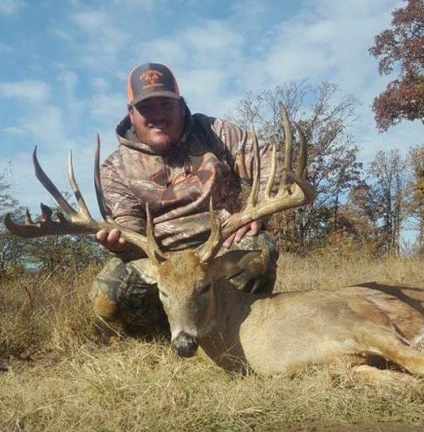 John Walker Drinnon with a 19-point buck. (Texas Parks and Wildlife Department)
