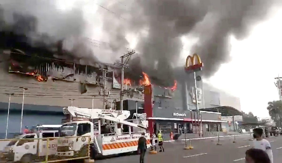 Smoke rises from burning mall's 3rd floor, in Davao City, Philippines, in this Dec. 23, 2017 picture obtained from social media. (Otto van Dacula via Reuters)