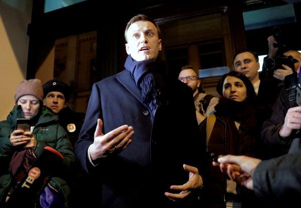 Russian opposition leader Alexei Navalny speaks to the media after submitting his documents to be registered as a presidential candidate at the Central Election Commission in Moscow, Russia, on Dec. 24, 2017. (Tatyana Makeyeva/Reuters)