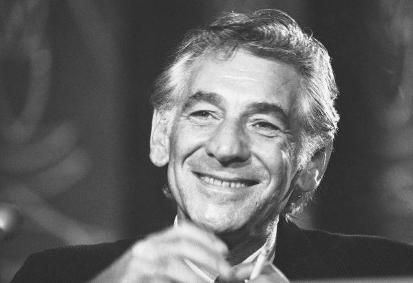 Conductor Leonard Bernstein tells reporters in Washington on July 26, 1971, that the work he is preparing for the 1971 opening of the John F. Kennedy Center for the Performing Arts is a "labour of love." (AP Photo/Charles Harrity, File)