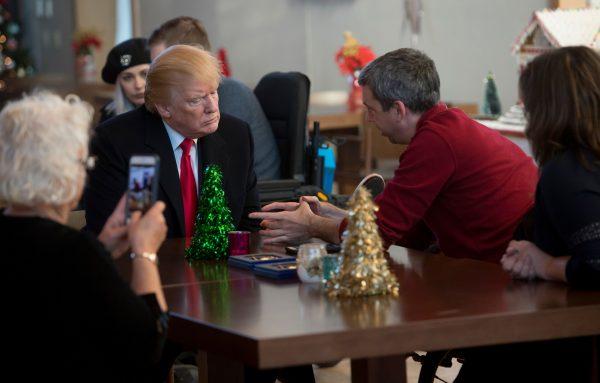 President Donald Trump meets with wounded veterans and their families at Walter Reed National Military Medical Center in Bethesda, Md., on Dec. 21, 2017. (SAUL LOEB/AFP/Getty Images)