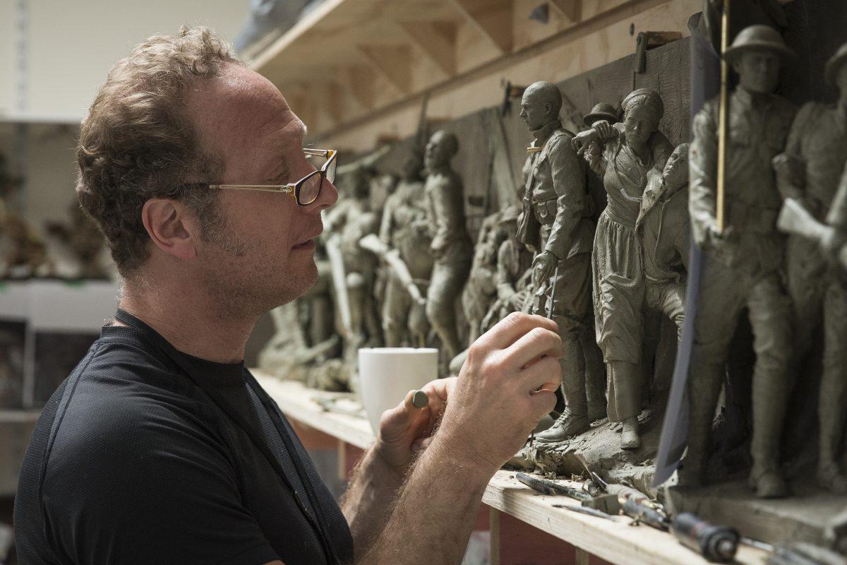 Sabin Howard sculpts the maquette of "A Soldier's Journey" at Weta Workshop in Wellington, New Zealand, in November 2017. (Courtesy of Sabin Howard)